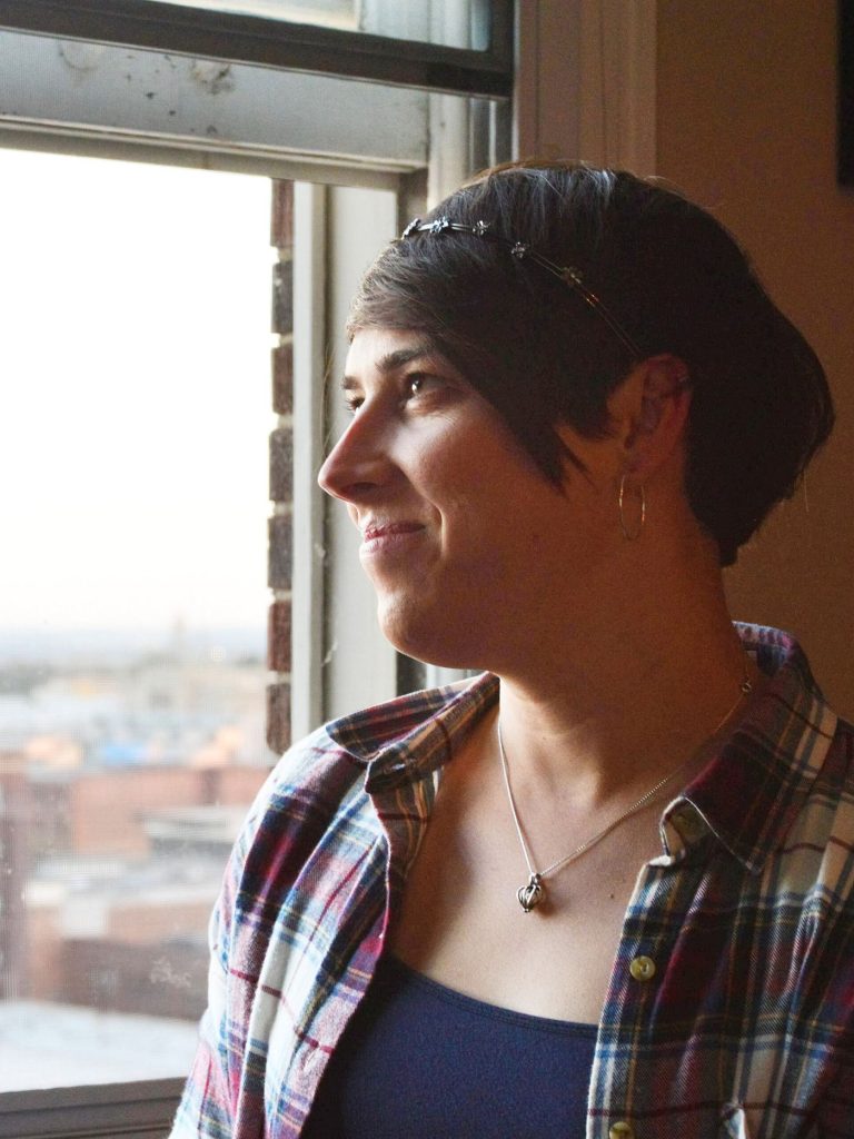 A person gazing out of a window