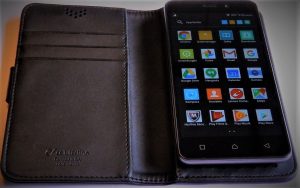 user unlocking smartphone with fingerprint for secure login